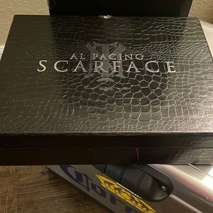 Scarface ultimate DVD gift set. New never unpackaged. Light damage to box.